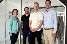 One female representative and two male representatives from RIGK, together with a manager from Berlin Packaging Rixius, at the kick-off meeting for the joint project in Wiesbaden.
